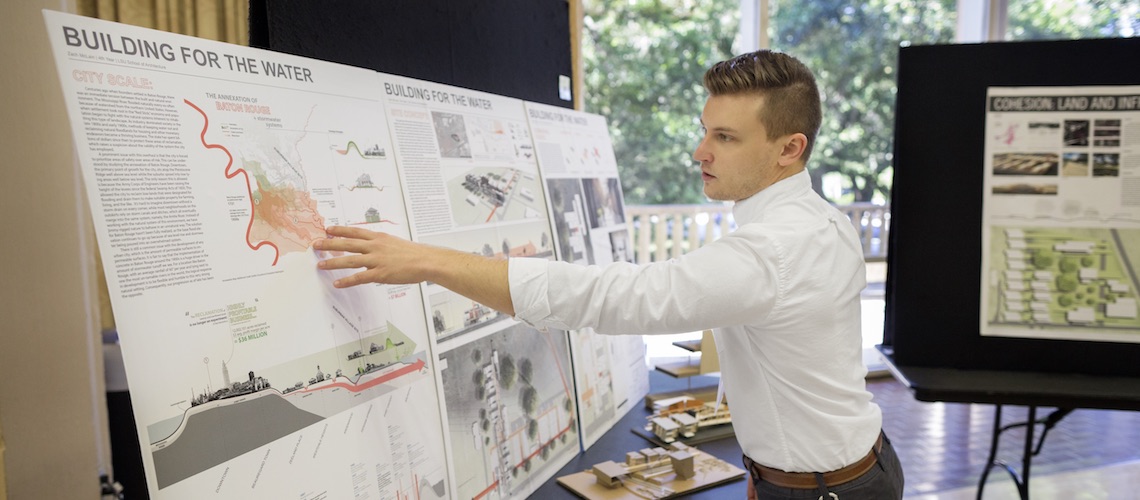 student presenting research at LSU Discover